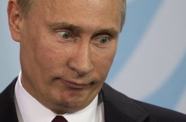 путін