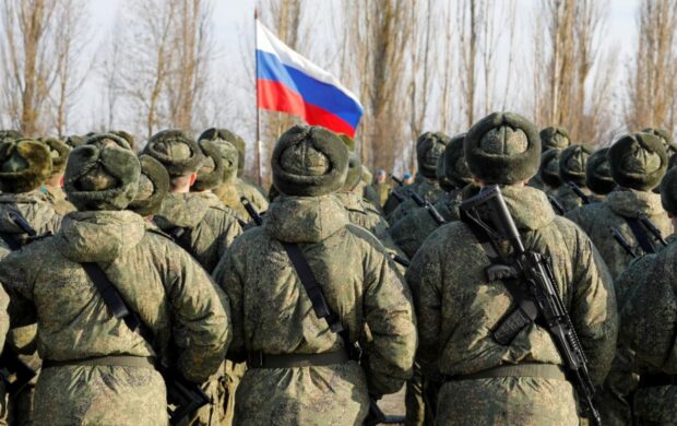 росія