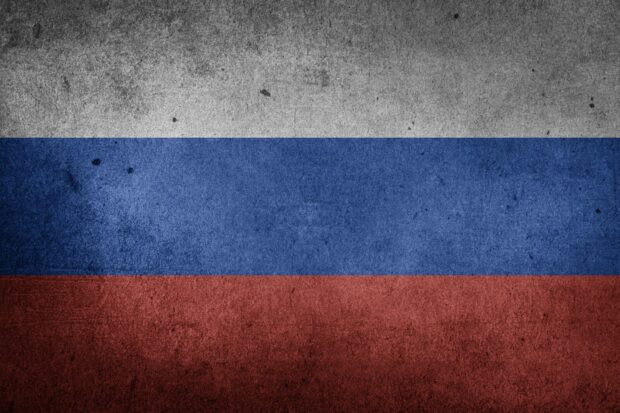 росія