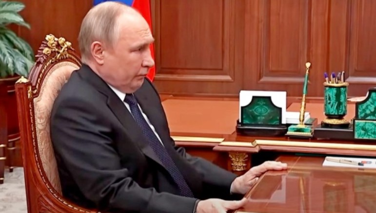 путін
