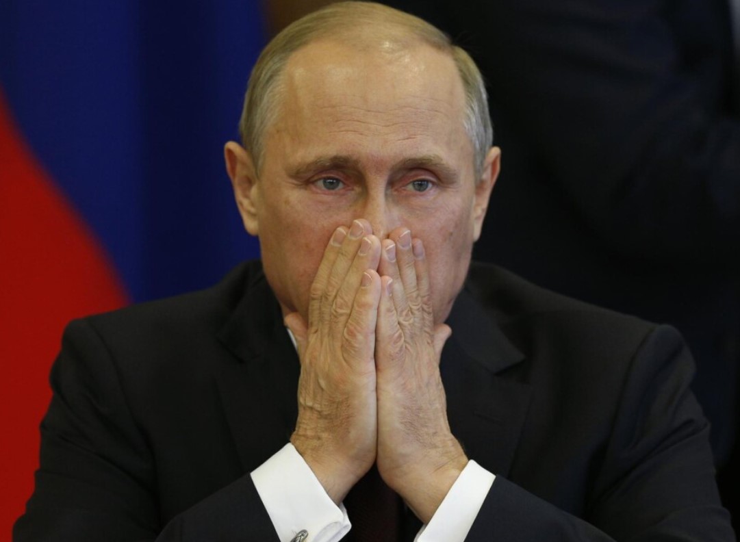 путін