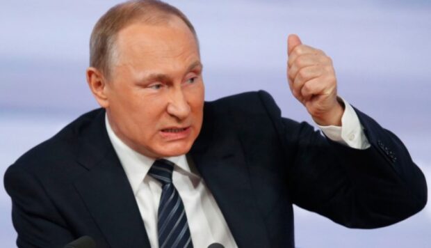 путін