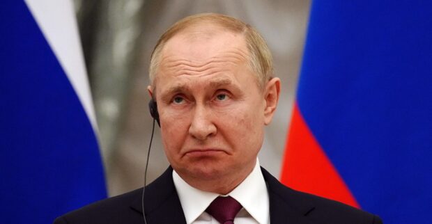 путін